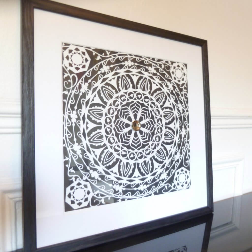 Mandala papercut white on black version: framed